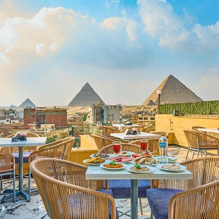 Cleopatra Tower Pyramid View Hotel Kafret el-Gabal Exterior foto